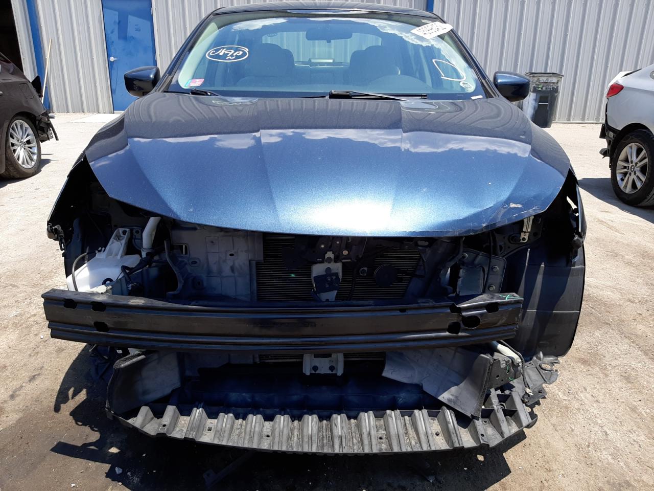 Photo 9 from auction – 2016 NISSAN SENTRA S with VIN 3N1AB7AP1GL670482