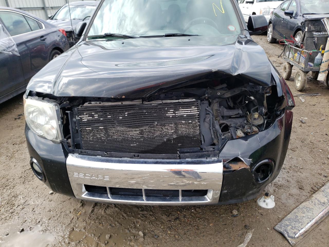 Photo 9 from auction – 2010 FORD ESCAPE LIM with VIN 1FMCU0E75AKA29535