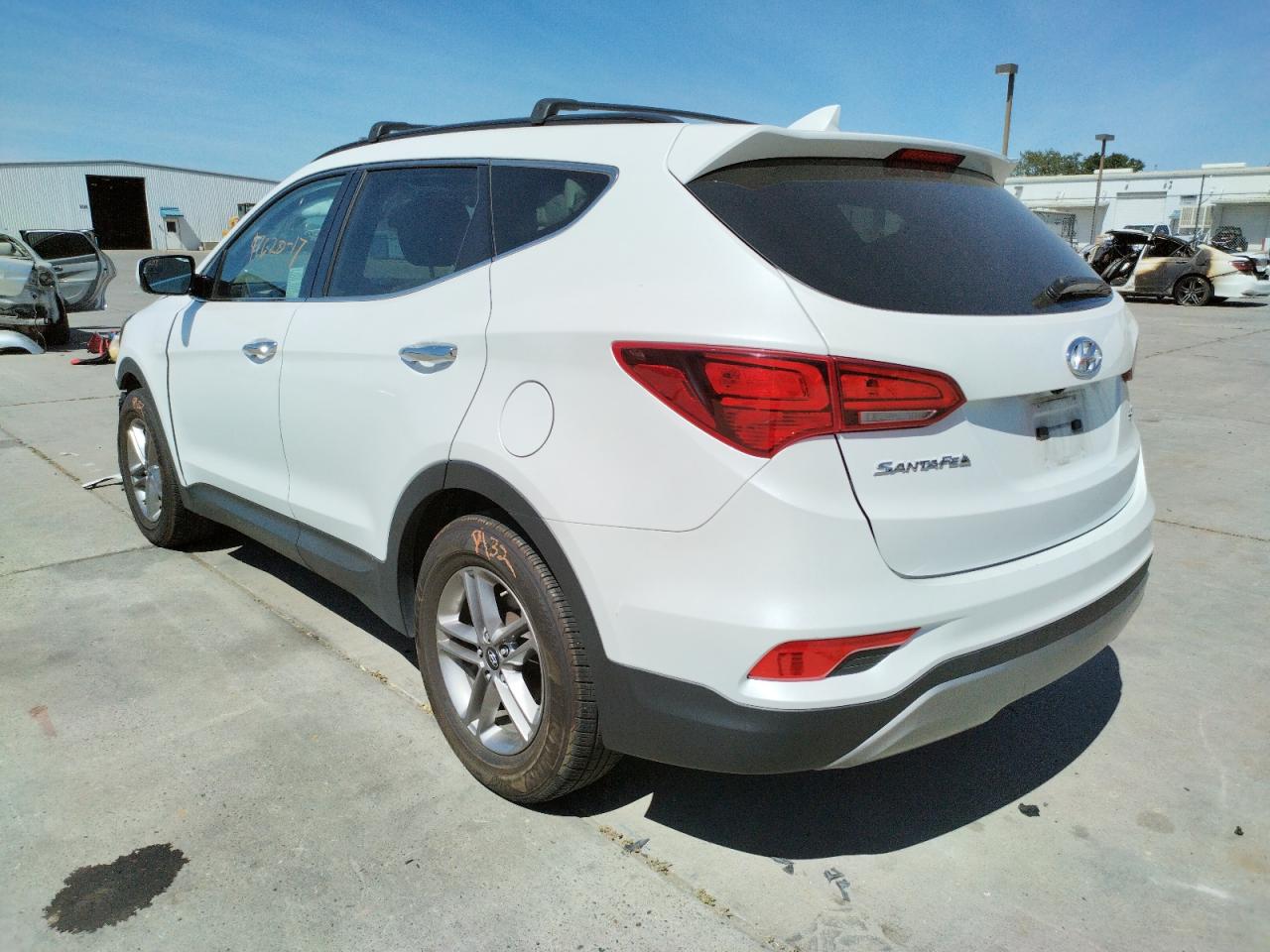Photo 3 from auction – 2017 HYUNDAI SANTA FE S with VIN 5NMZU3LB2HH006338