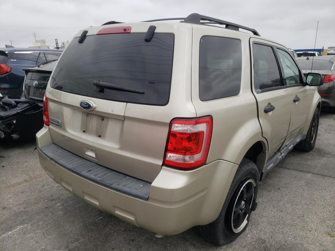 Photo 4 from auction – 2010 FORD ESCAPE XLT with VIN 1FMCU0D72AKD20060
