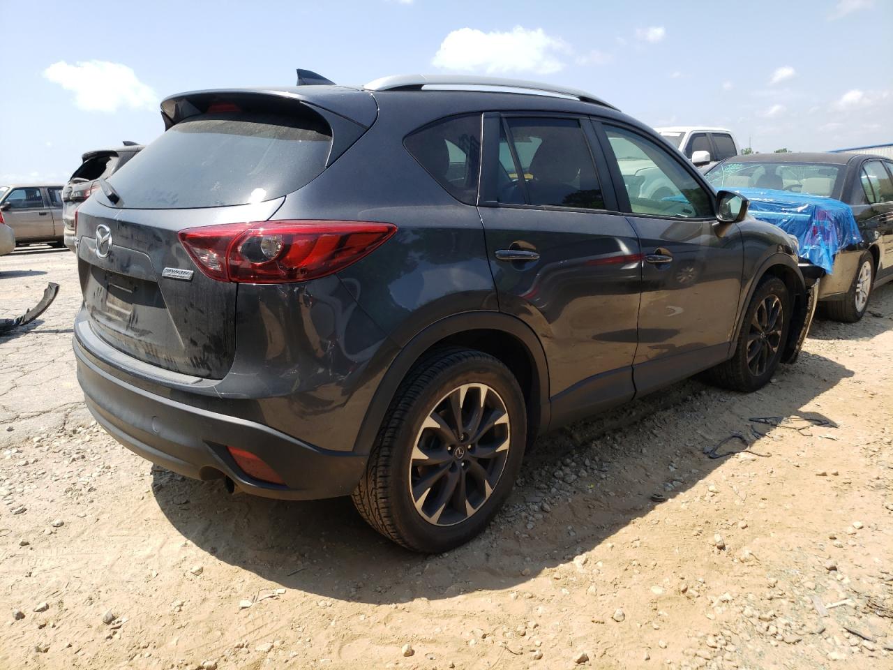 Photo 4 from auction – 2016 MAZDA CX-5 GT with VIN JM3KE2DY5G0632970