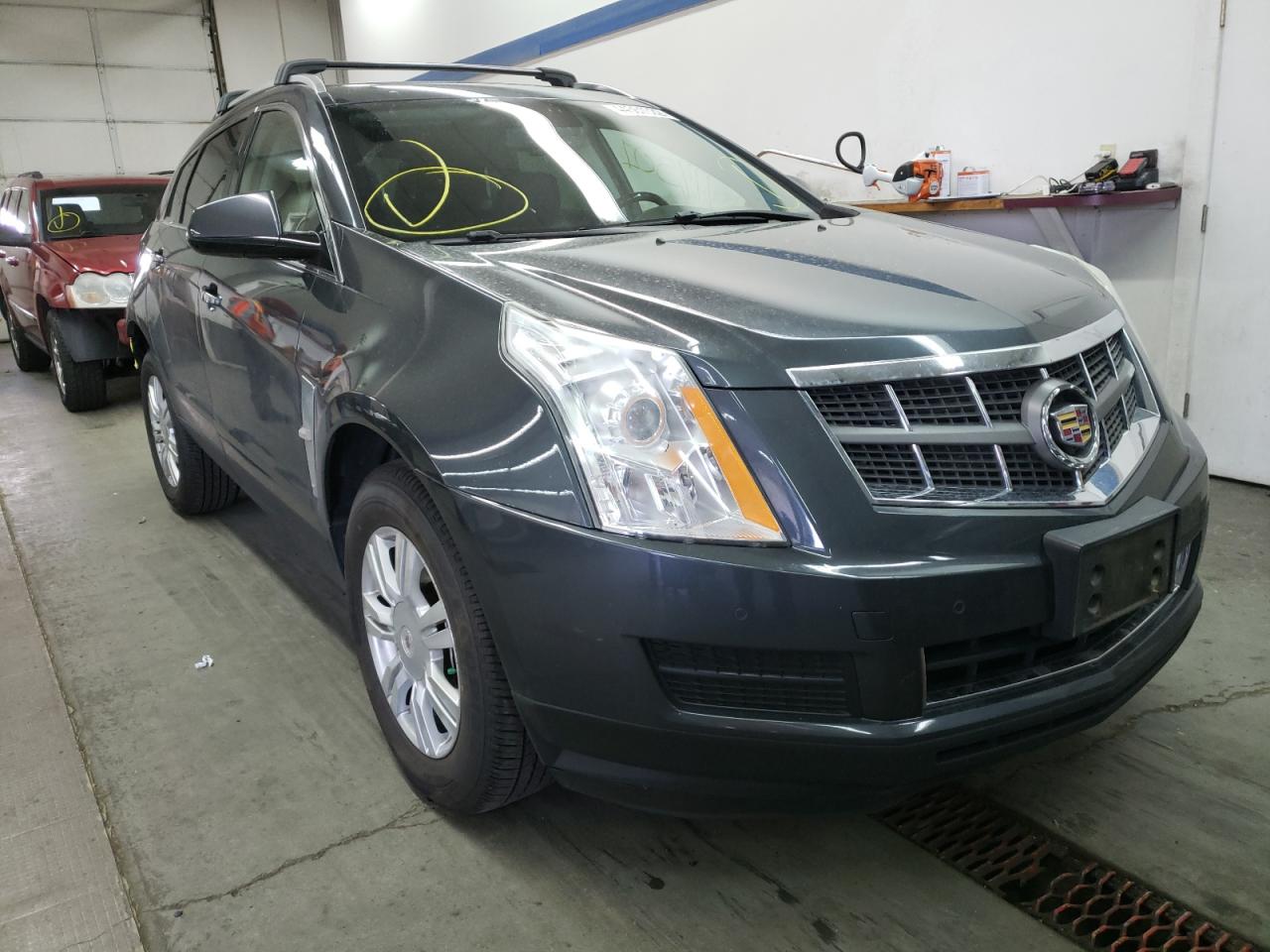 CADILLAC SRX LUXURY 2012 with VIN 3GYFNAE39CS640171 - Photo from auction
