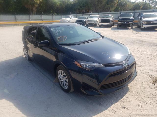 TOYOTA COROLLA L 2018 with VIN 5YFBURHE6JP853950 - Photo from auction