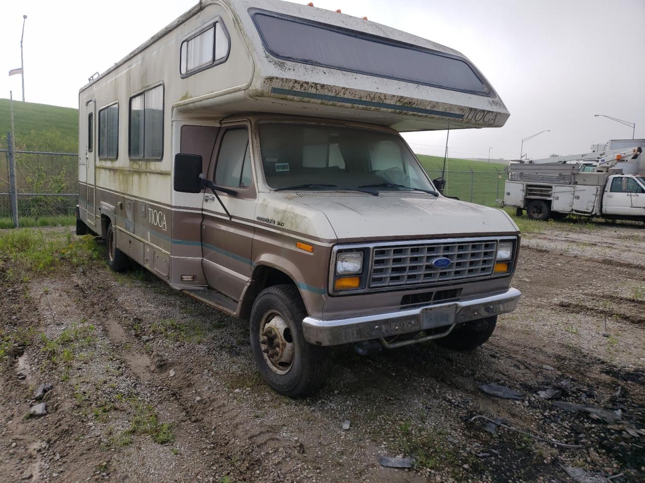 FORD ECONOLINE 1990 مع رقم تعريف المركبة 1FDKE30G5LHA45882 - صورة من المزاد