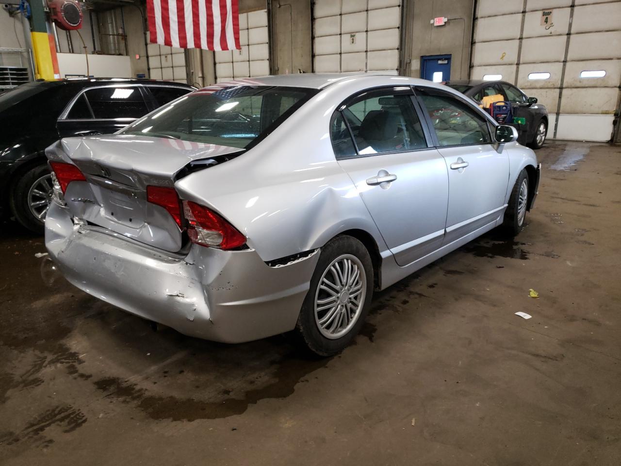 Photo 17 from auction – 2011 HONDA CIVIC LX with VIN 19XFA1F56BE040562