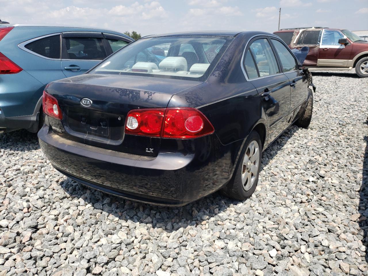 Photo 4 from auction – 2006 KIA OPTIMA LX with VIN KNAGE123865022513