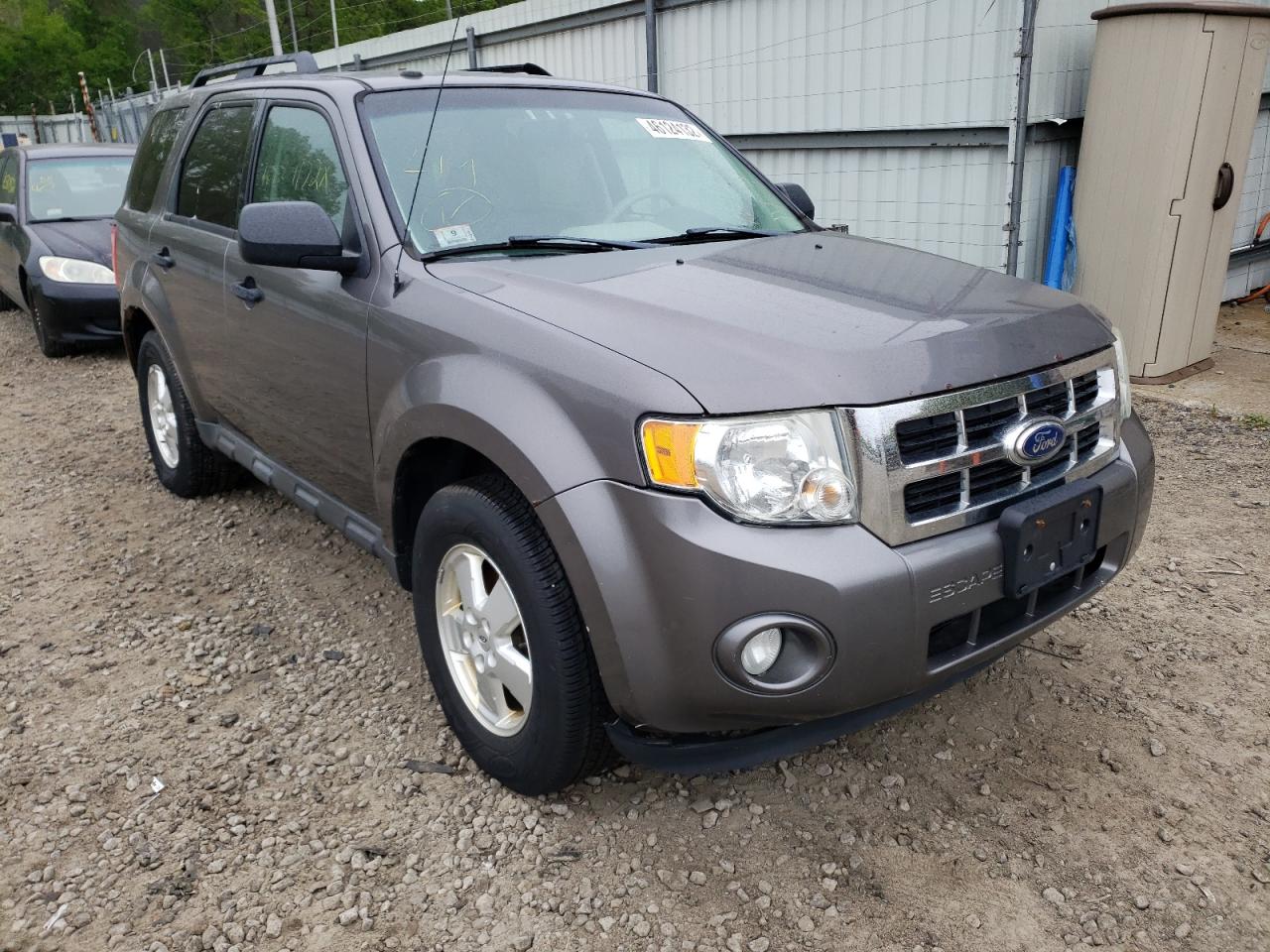 FORD ESCAPE XLT 2011 with VIN 1FMCU9DG1BKC39041 - Photo from auction