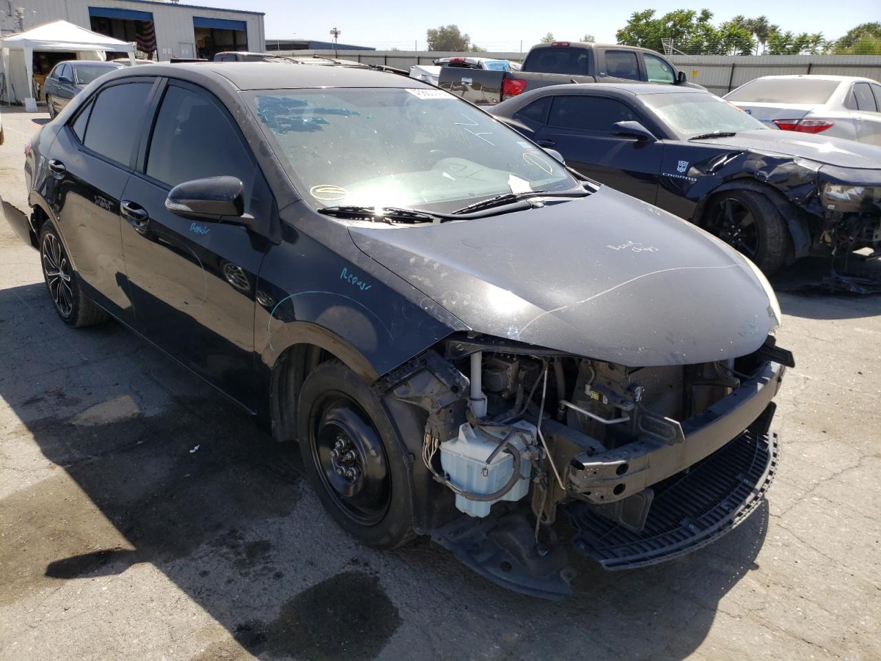 TOYOTA COROLLA L 2014 with VIN 5YFBURHE9EP047249 - Photo from auction