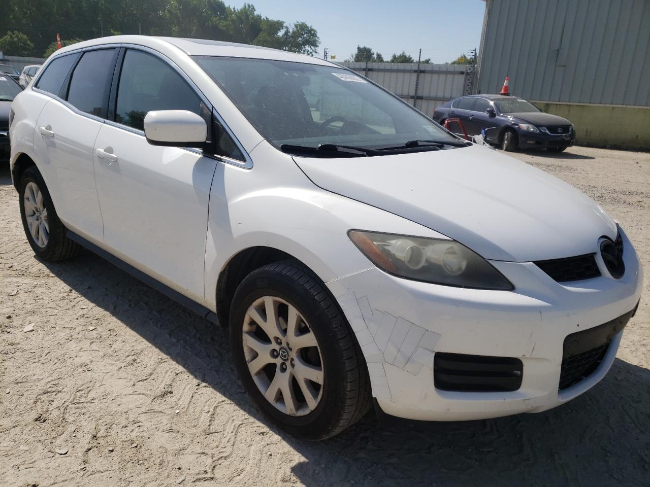 MAZDA CX-7 2009 with VIN JM3ER29L390222878 - Photo from auction