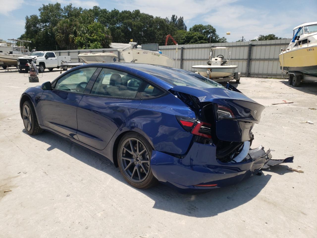 Photo 16 from auction – 2022 TESLA MODEL 3 with VIN 5YJ3E1EA0NF189974
