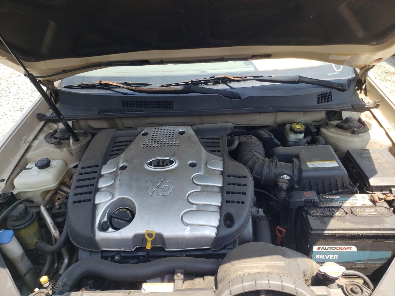 Photo 7 from auction – 2006 KIA OPTIMA LX with VIN KNAGE124865068500