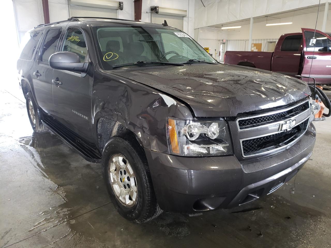 CHEVROLET SUBURBAN K 2011 with VIN 1GNSKHE34BR224592 - Photo from auction