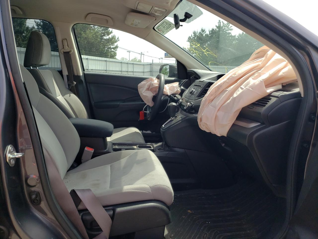 Photo 5 from auction – 2015 HONDA CR-V LX with VIN 5J6RM4H31FL077379
