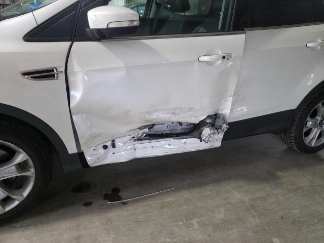 Photo 9 from auction – 2015 FORD ESCAPE TIT with VIN 1FMCU9J96FUC00137