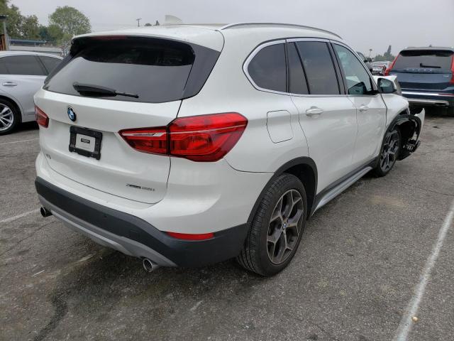 Photo 4 from auction – 2019 BMW X1 XDRIVE2 with VIN WBXHT3C51K5L38423