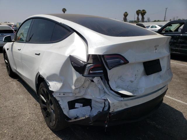 Photo 9 from auction – 2021 TESLA MODEL Y with VIN 5YJYGDEE0MF269133