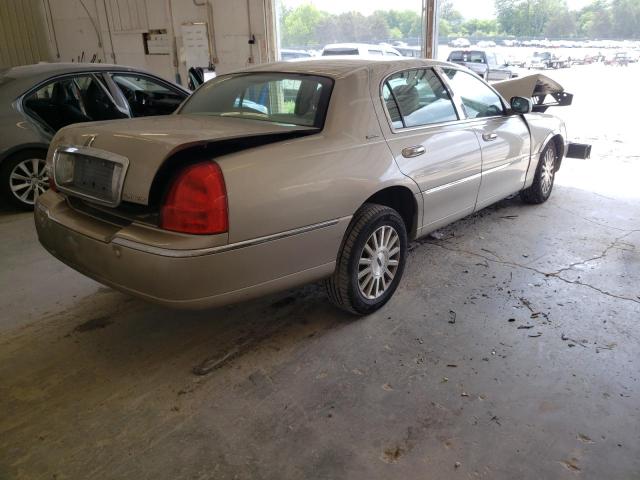Photo 4 from auction – 2004 LINCOLN TOWN CAR E with VIN 1LNHM81W24Y659547