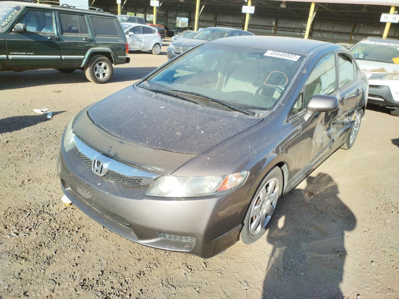 Photo 2 from auction – 2011 HONDA CIVIC LX with VIN 19XFA1F54BE035392