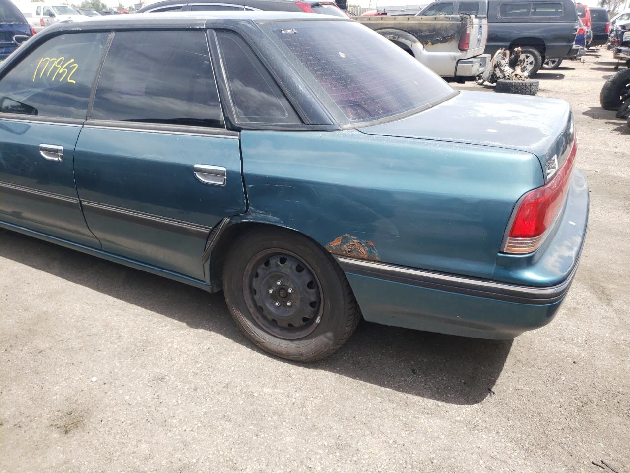 Photo 9 from auction – 1994 SUBARU LEGACY L with VIN 4S3BC6339R7649910