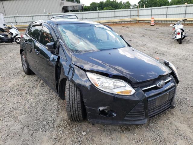 FORD FOCUS 2014 with VIN 1FADP3K20EL329709 - Photo from auction