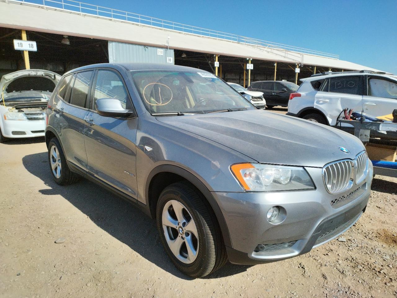 BMW X3 XDRIVE2 2011 with VIN 5UXWX5C54BL703563 - Photo from auction