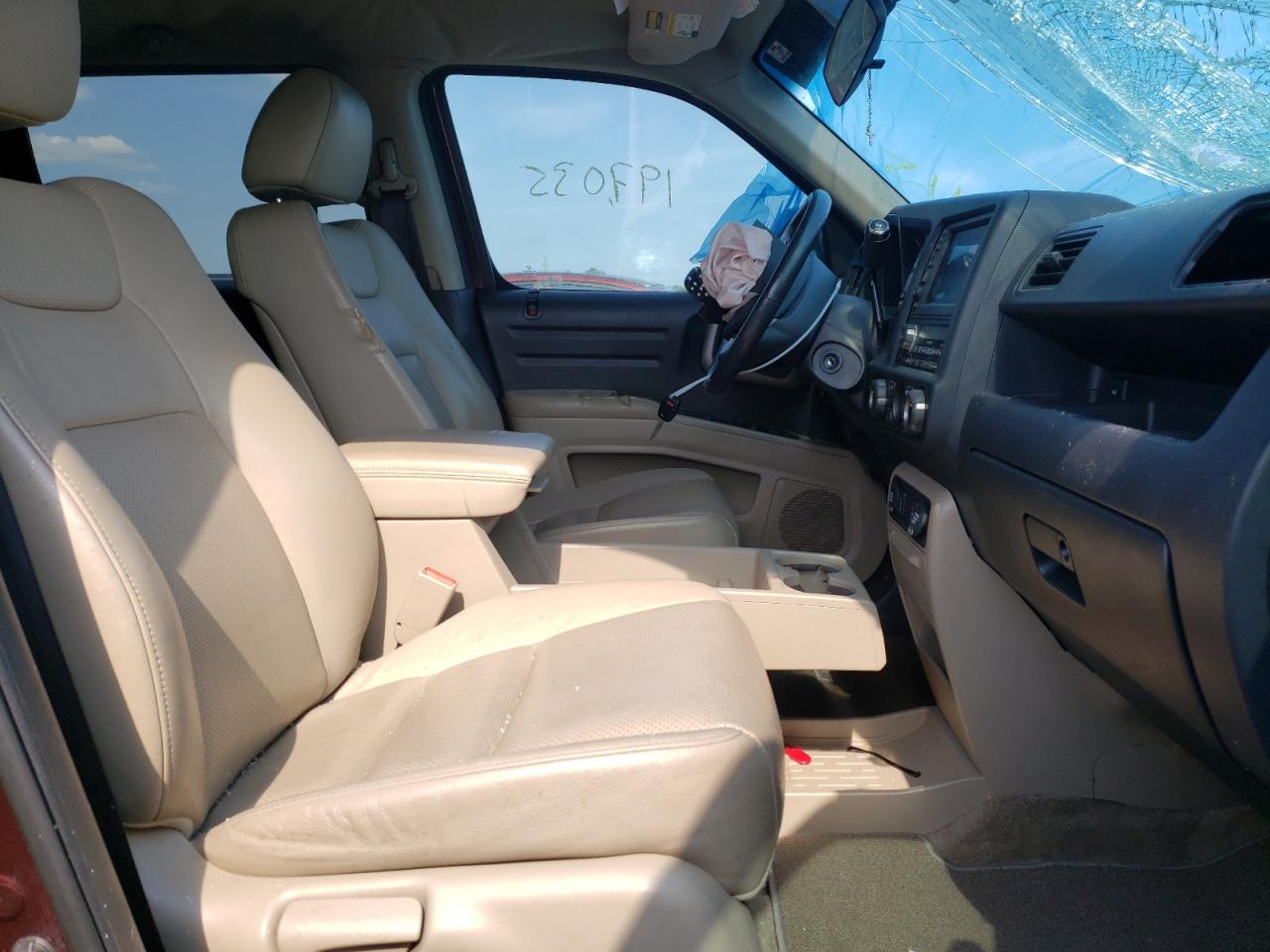 Photo 5 from auction – 2012 HONDA RIDGELINE with VIN 5FPYK1F57CB459514