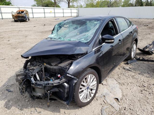Photo 2 from auction – 2015 FORD FOCUS TITA with VIN 1FADP3J22FL340309