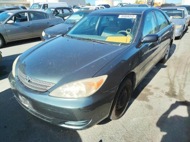 Photo 2 from auction – 2002 TOYOTA CAMRY LE with VIN JTDBE32K620058028