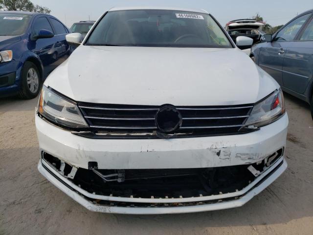 Photo 9 from auction – 2017 VOLKSWAGEN JETTA S with VIN 3VW2B7AJXHM333038