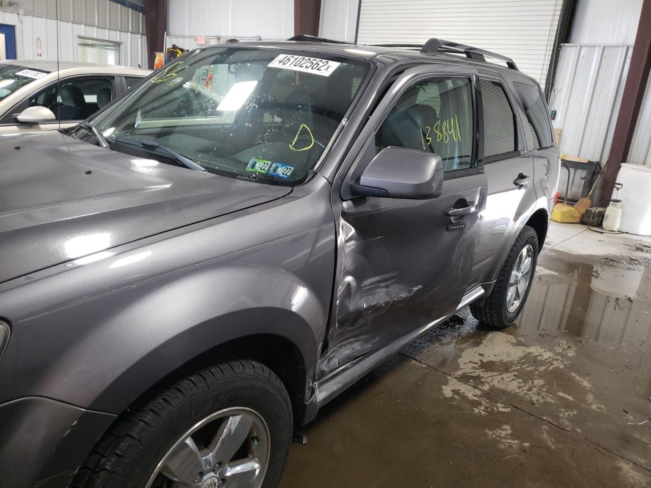 Photo 9 from auction – 2011 MERCURY MARINER PR with VIN 4M2CN9HGXBKJ00919
