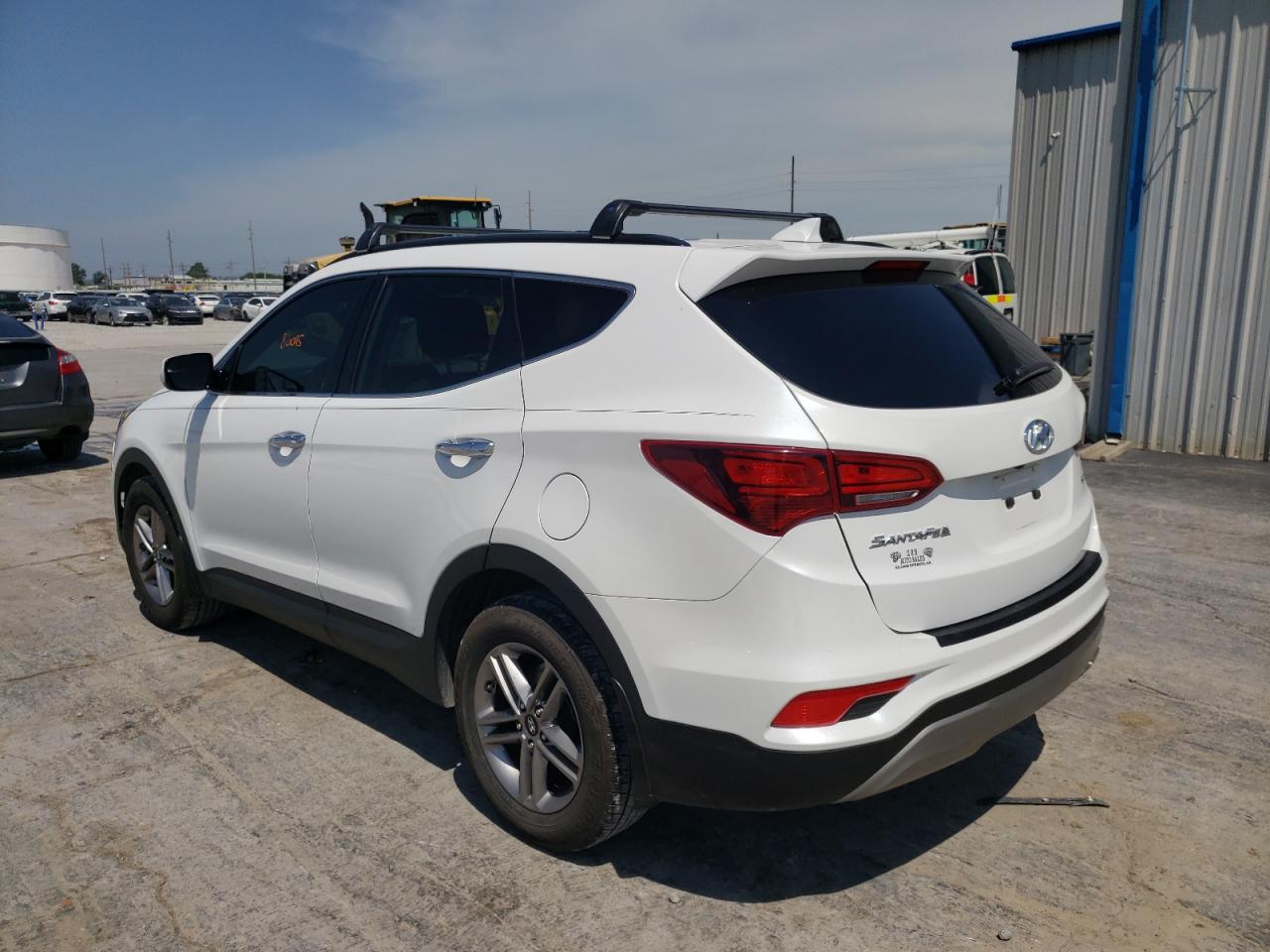 Photo 3 from auction – 2017 HYUNDAI SANTA FE S with VIN 5NMZU3LB8HH003749