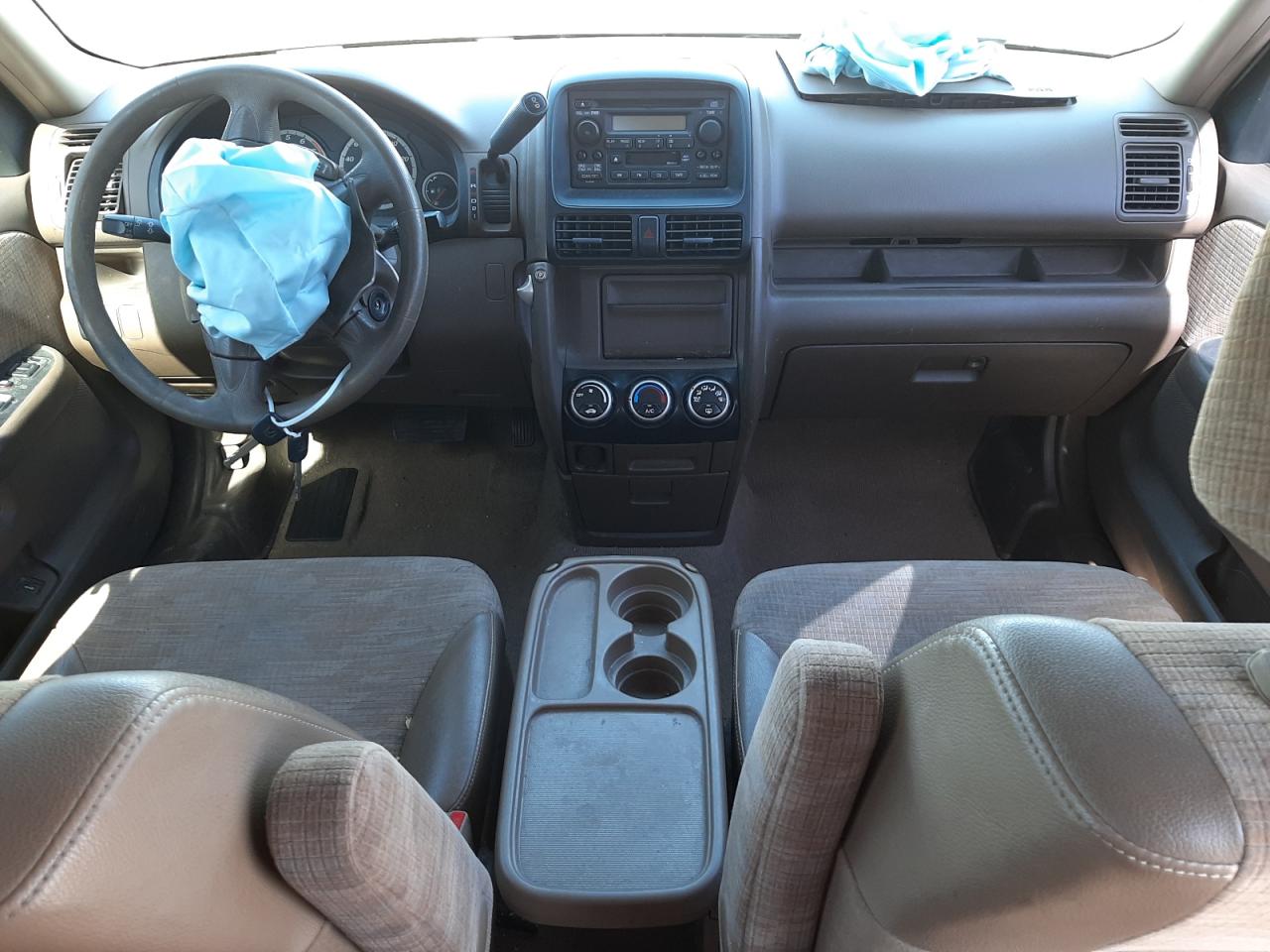 Photo 18 from auction – 2002 HONDA CR-V LX with VIN JHLRD68472C019154
