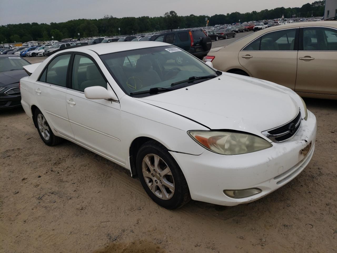 TOYOTA CAMRY LE 2004 with VIN JTDBE32KX40251463 - Photo from auction