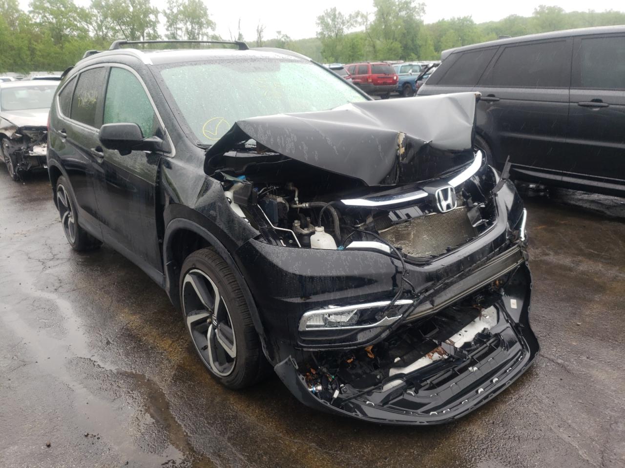 HONDA CR-V EXL 2015 with VIN 2HKRM4H71FH651394 - Photo from auction