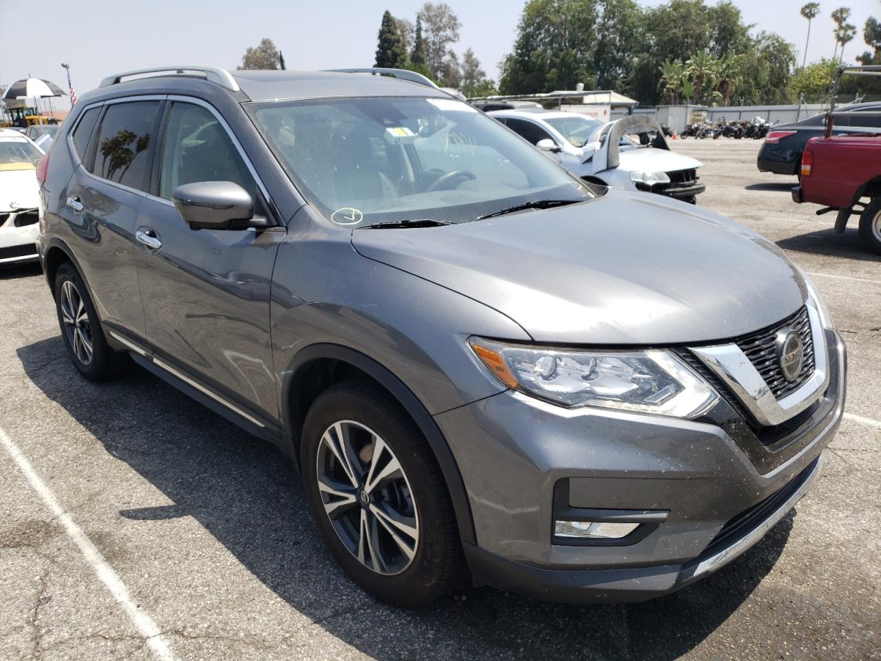 NISSAN ROGUE S 2018 with VIN 5N1AT2MV8JC797445 - Photo from auction
