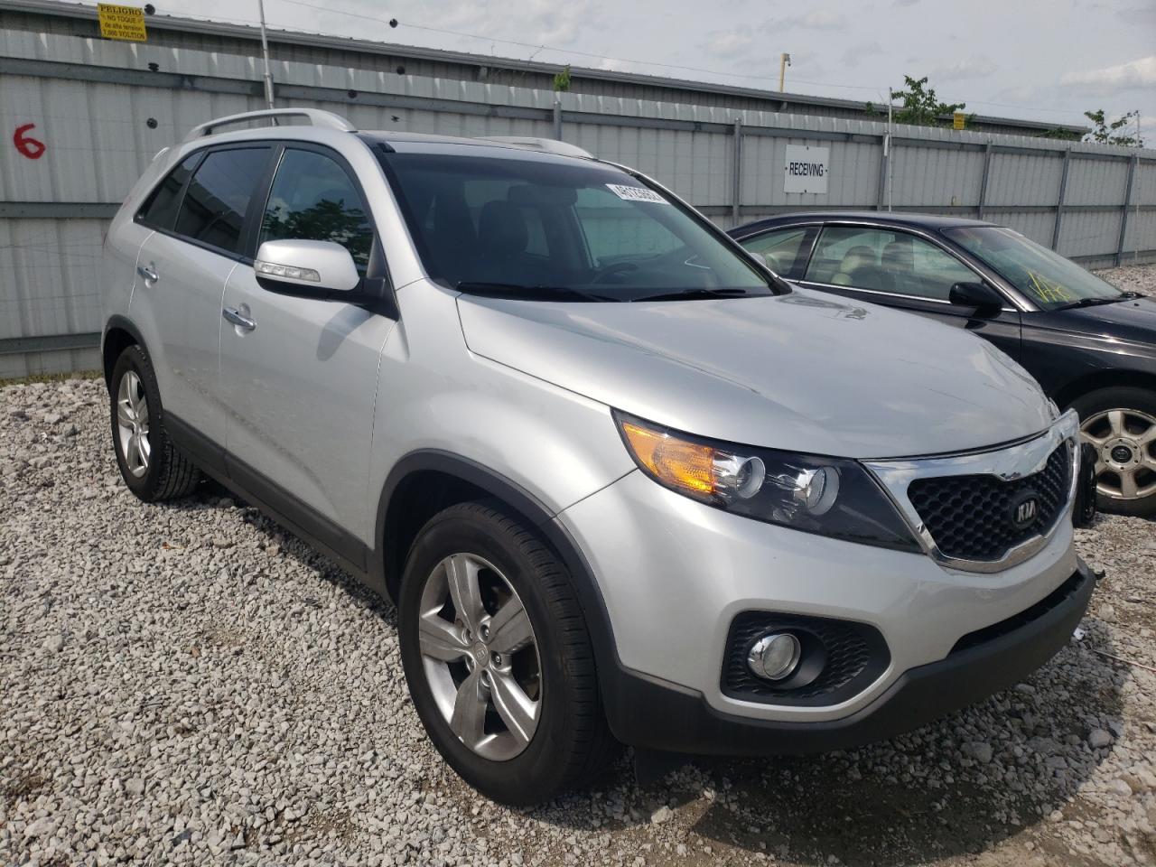 KIA SORENTO EX 2012 with VIN 5XYKU4A29CG187595 - Photo from auction