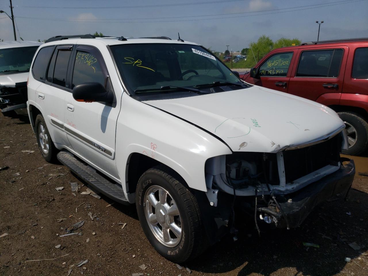 GMC ENVOY 2004 with VIN 1GKDT13S642320336 - Photo from auction