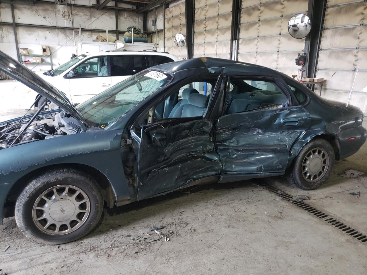 Photo 9 from auction – 1996 FORD TAURUS LX with VIN 1FALP53S3TG201816