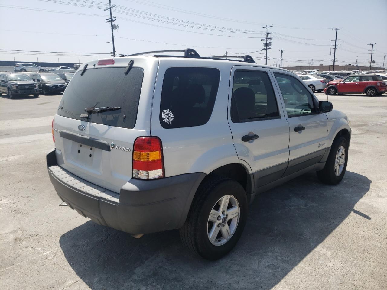 Photo 4 from auction – 2006 FORD ESCAPE HEV with VIN 1FMCU95H16KB20998