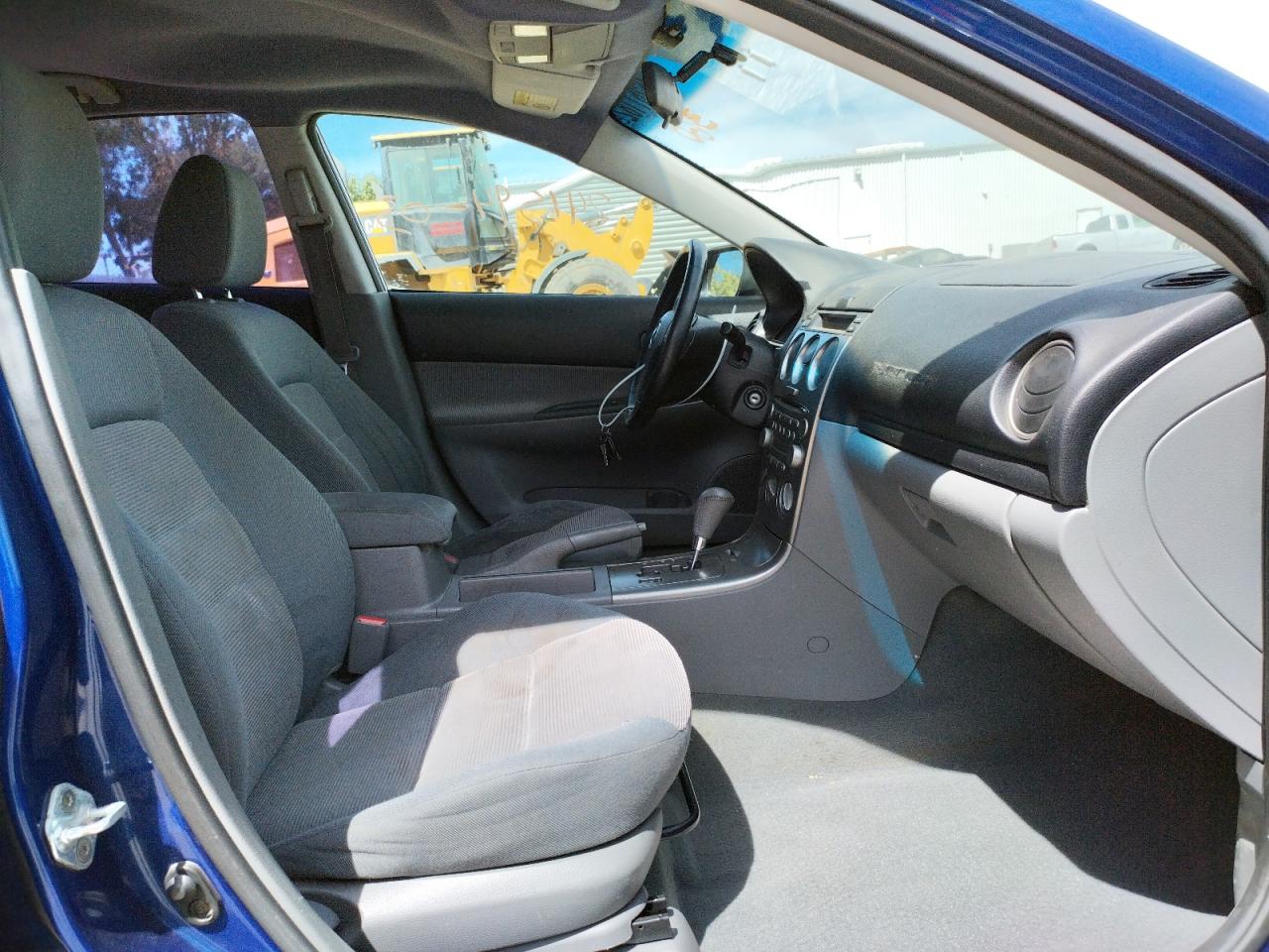 Photo 5 from auction – 2003 MAZDA 6 I with VIN 1YVFP80CX35M55079