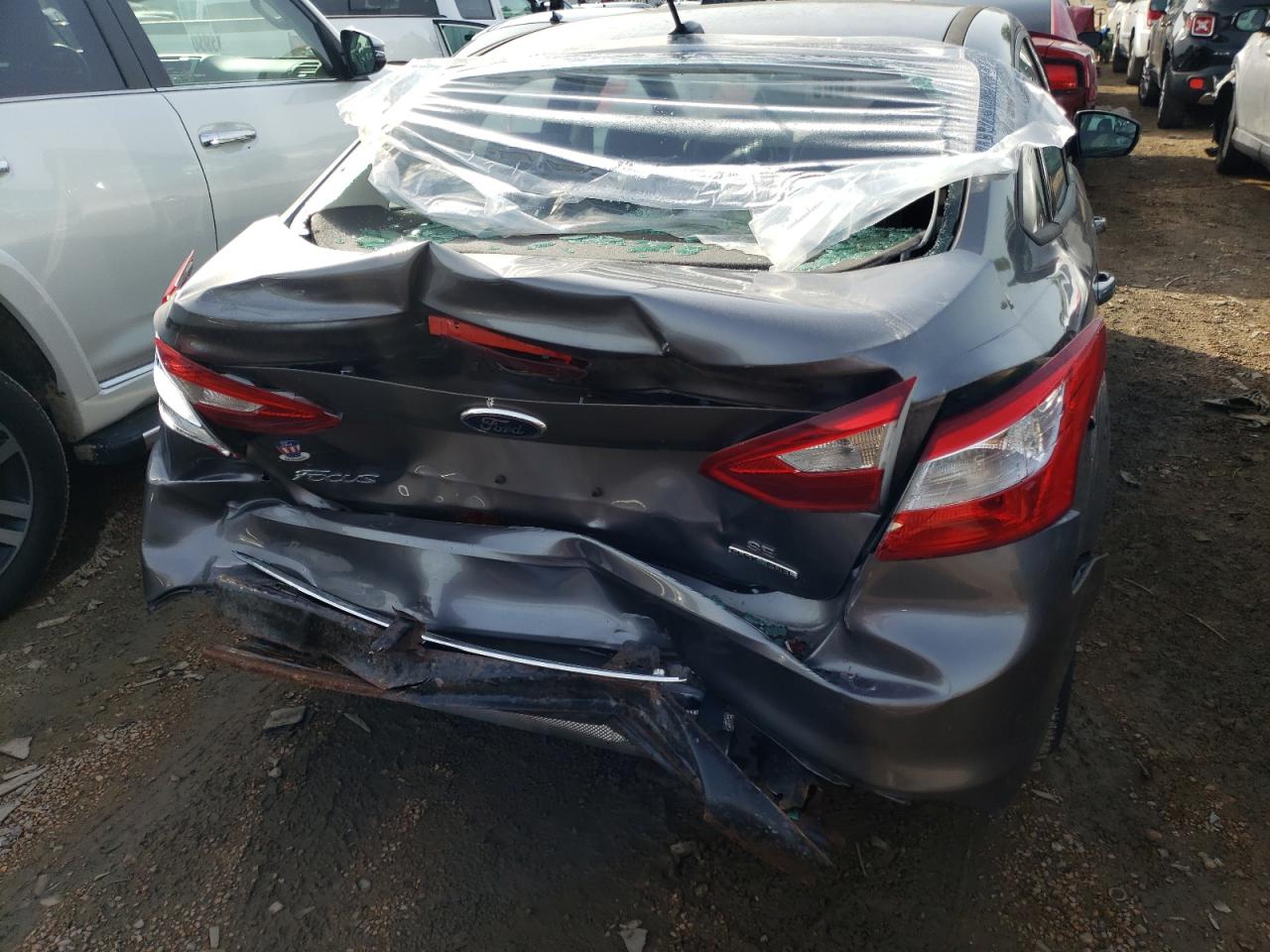 Photo 9 from auction – 2014 FORD FOCUS SE with VIN 1FADP3F2XEL229658