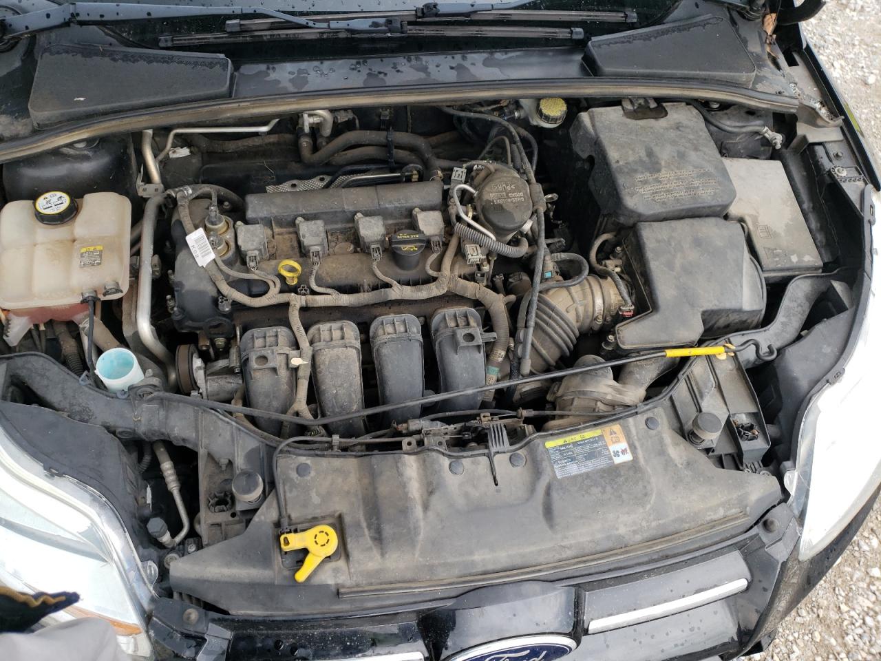 Foto 7 de la subasta – 2012 FORD FOCUS SEL con VIN 1FAHP3M26CL357168