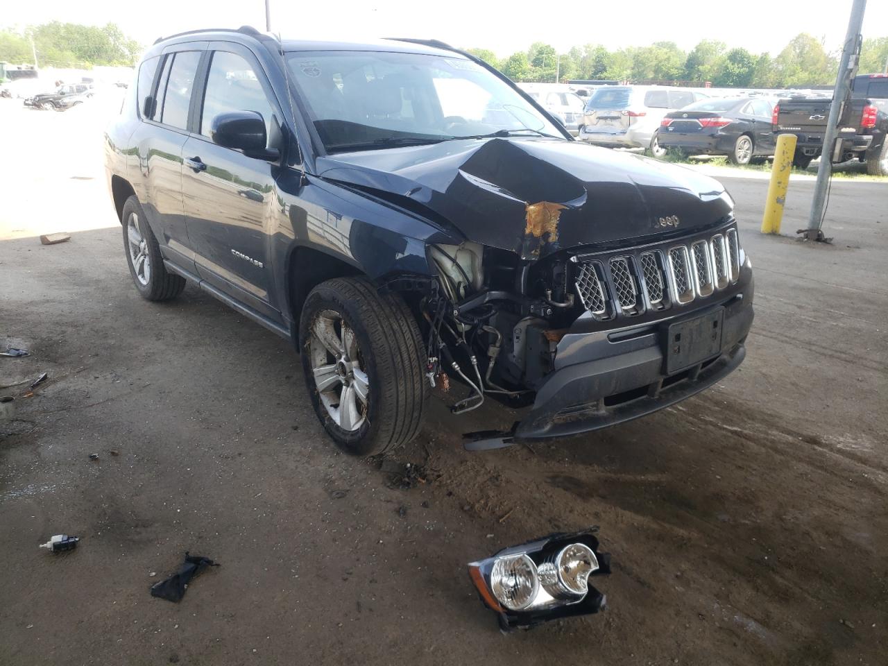 JEEP COMPASS LA 2014 with VIN 1C4NJCEB9ED628878 - Photo from auction