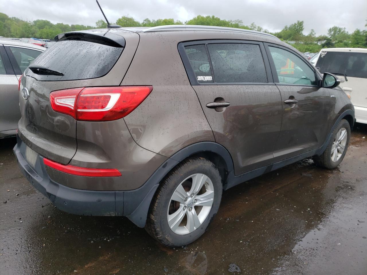 Photo 4 from auction – 2012 KIA SPORTAGE L with VIN KNDPBCA27C7263124