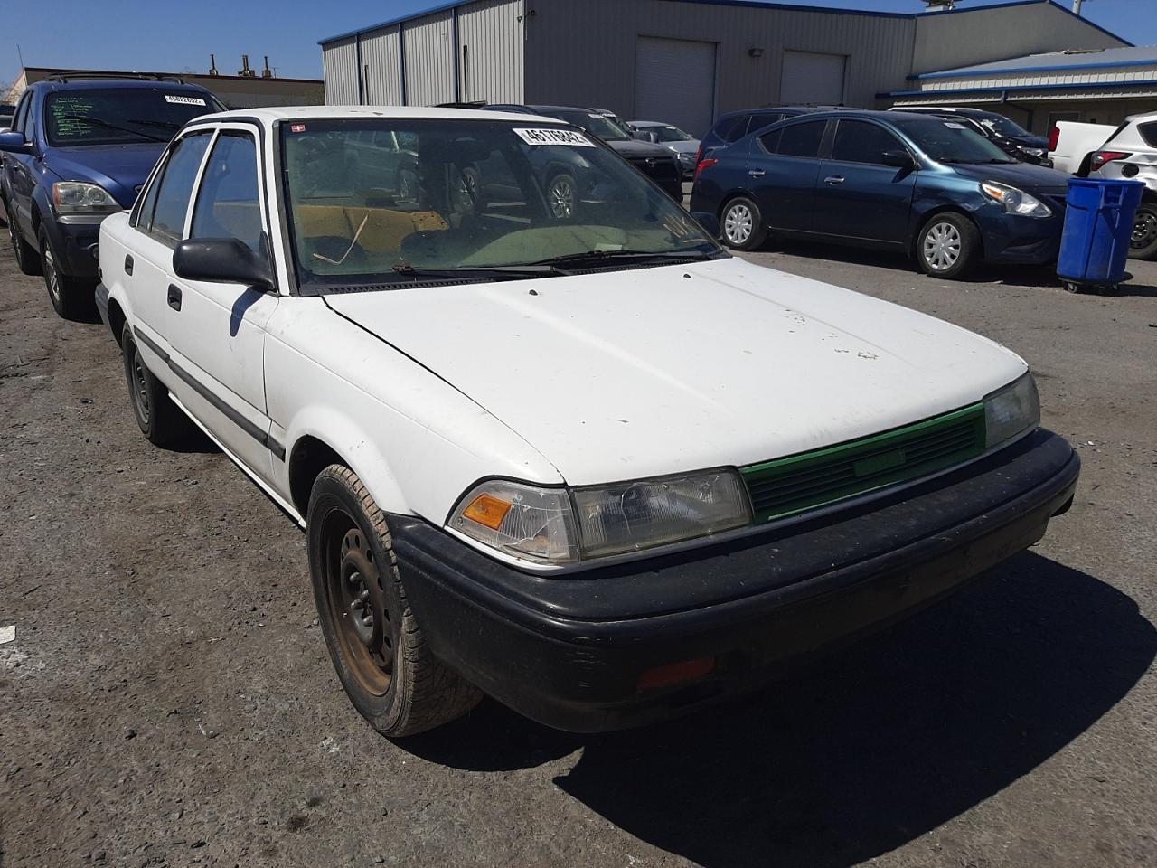 TOYOTA COROLLA DL 1990 with VIN 1NXAE94A9LZ152333 - Photo from auction