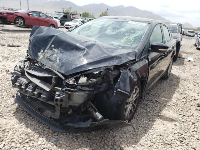 Photo 2 from auction – 2016 FORD FOCUS SE with VIN 1FADP3F23GL272015