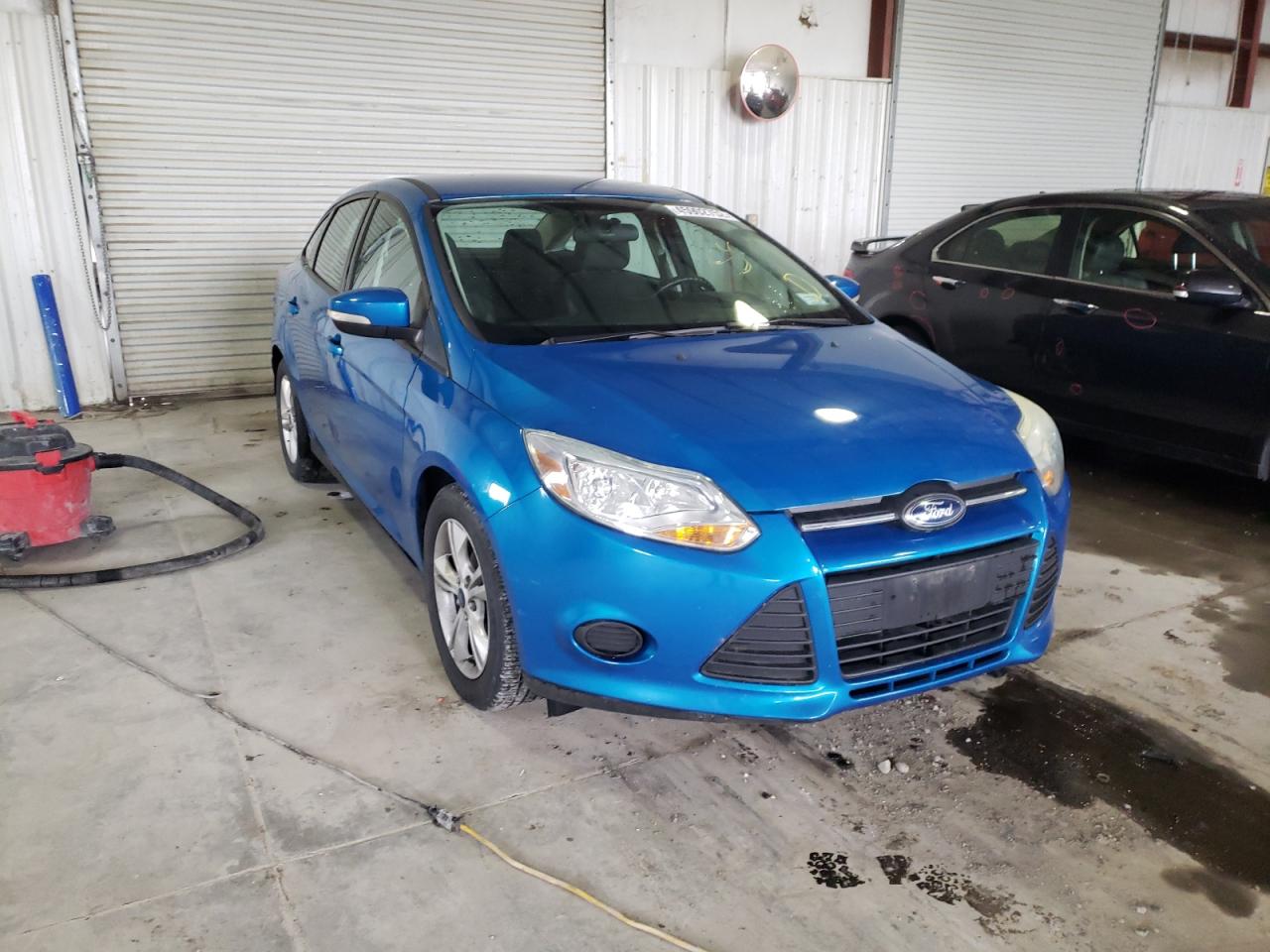 FORD FOCUS SE 2014 with VIN 1FADP3F2XEL402451 - Photo from auction