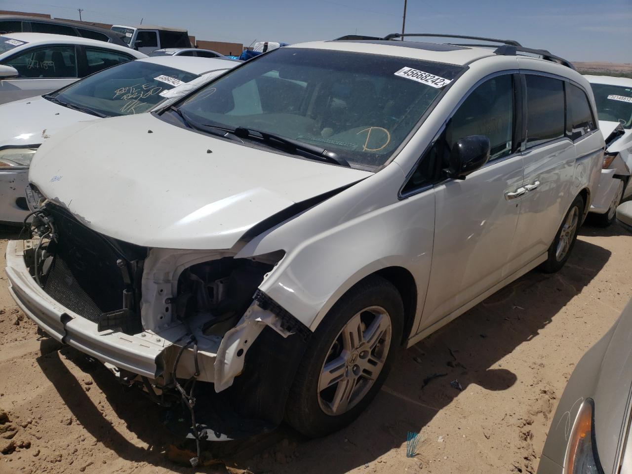 Photo 2 from auction – 2012 HONDA ODYSSEY TO with VIN 5FNRL5H95CB020958