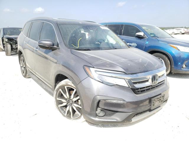HONDA PILOT TOUR 2019 with VIN 5FNYF5H60KB011916 - Photo from auction