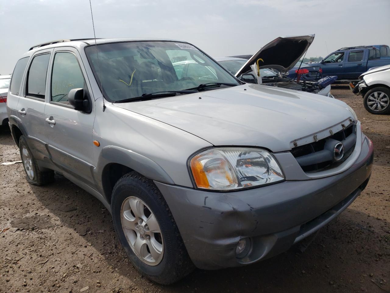 MAZDA TRIBUTE LX 2002 with VIN 4F2YU08122KM21939 - Photo from auction
